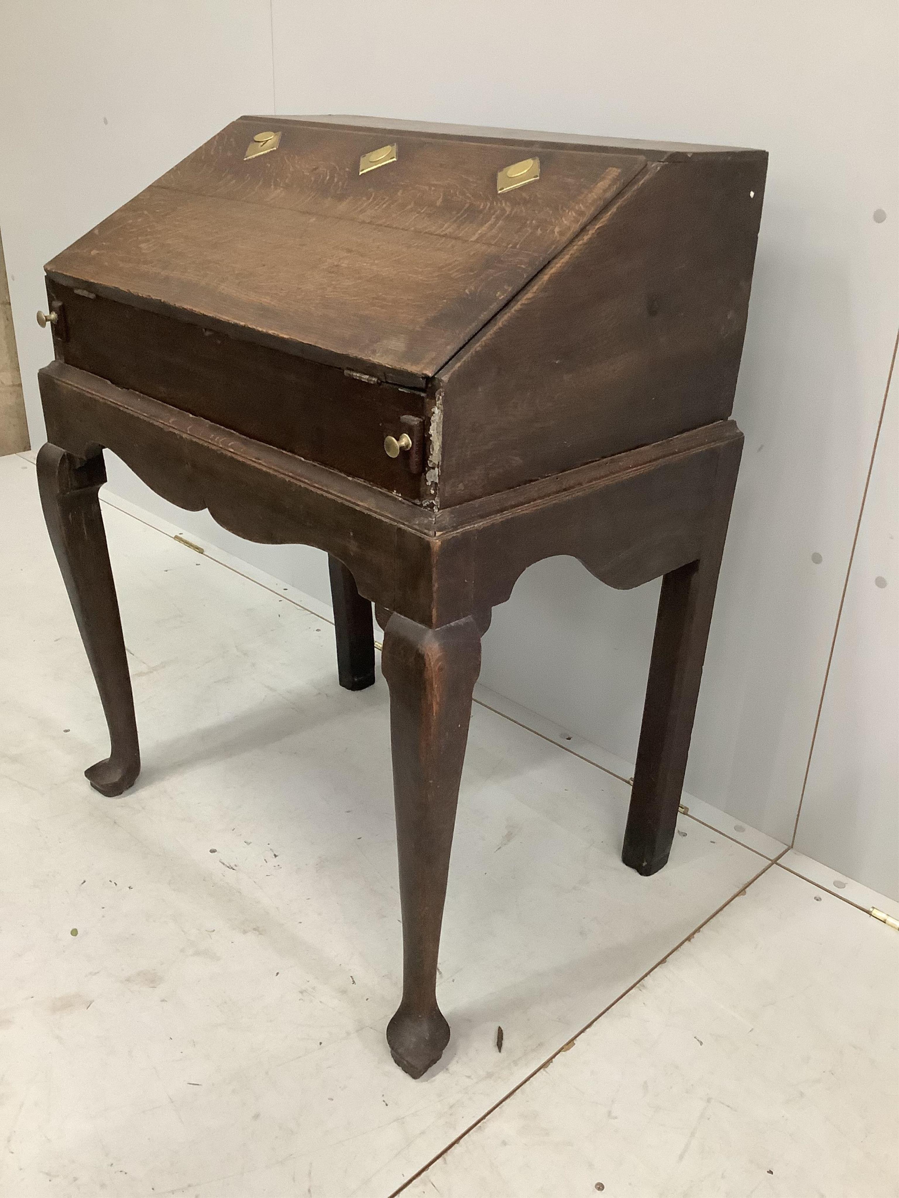 A late 18th century oak bureau on stand, width 78cm, depth 54cm, height 97cm. Condition - fair